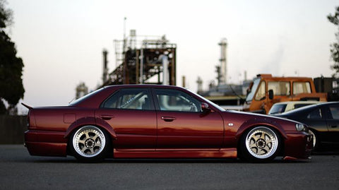 URAS Nissan Skyline R34 (ER34) Type Q Rear Bumper (4 Door)