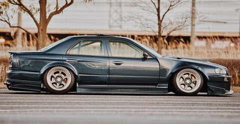 URAS Nissan Skyline R34 (ER34) D1 Spec Front and Rear Wide Fender Set (4 Door)